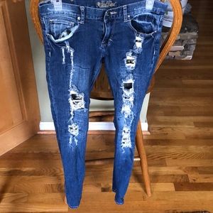 Red Rivet ripped jeans